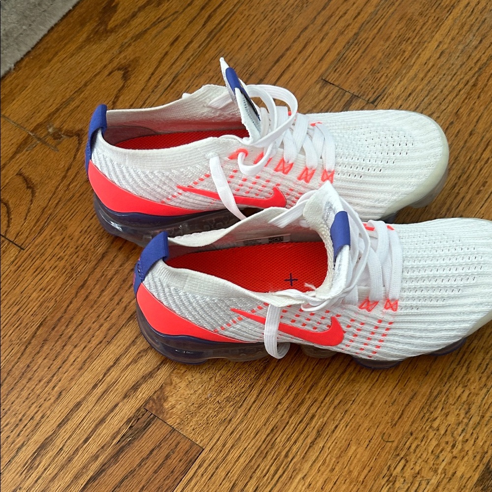 Nike Women’s White and Red Sneakers